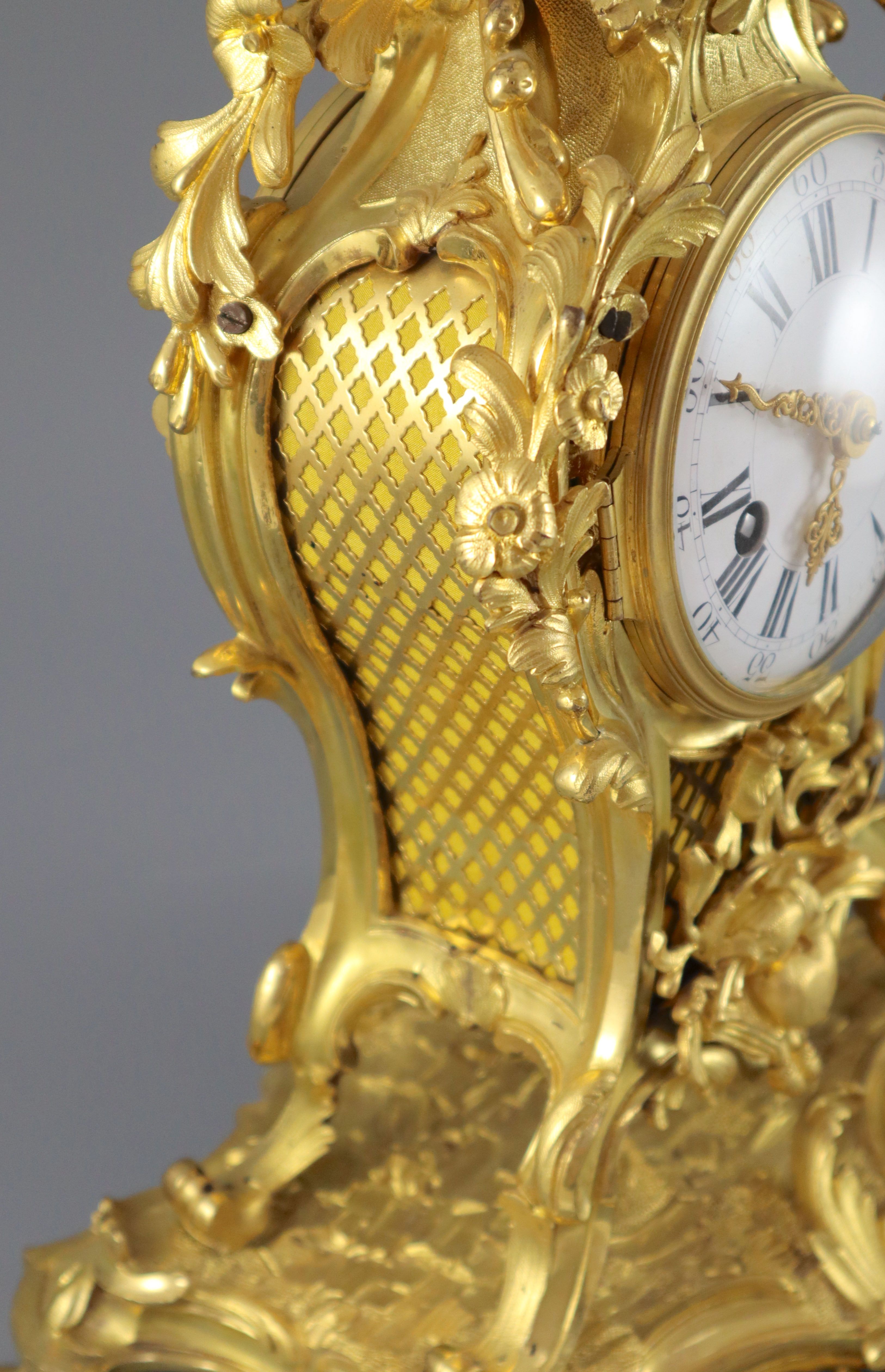 A mid 18th century French ormolu mantel clock, height 15in.